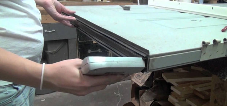 damaged steel door repair Hanford